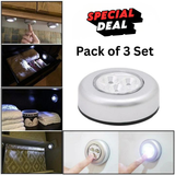 Set of three Avira 3-LED battery-powered tap push lights with compact design and easy installation for illuminating dark spaces.